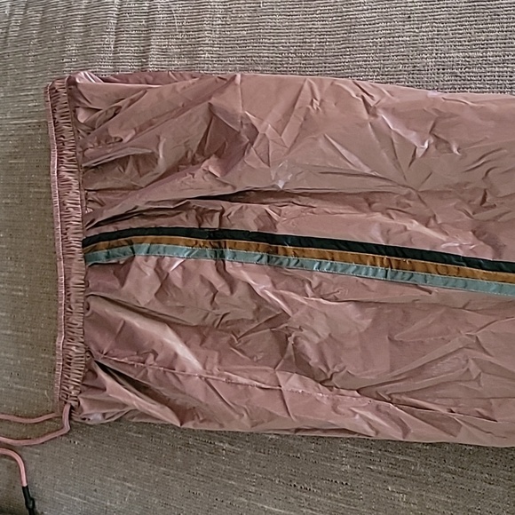 Pants they are brand new, rose color with stripes down the side. - Picture 4 of 10